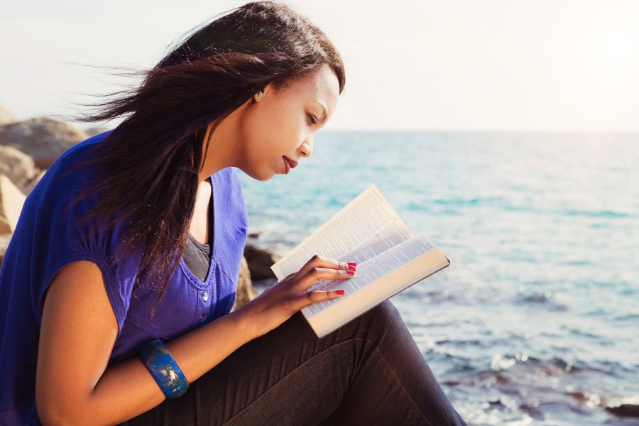Girl reading a Bible