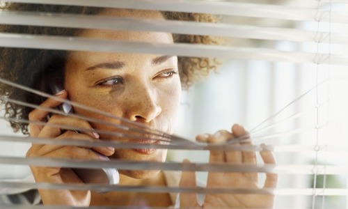 woman-looking-out-window