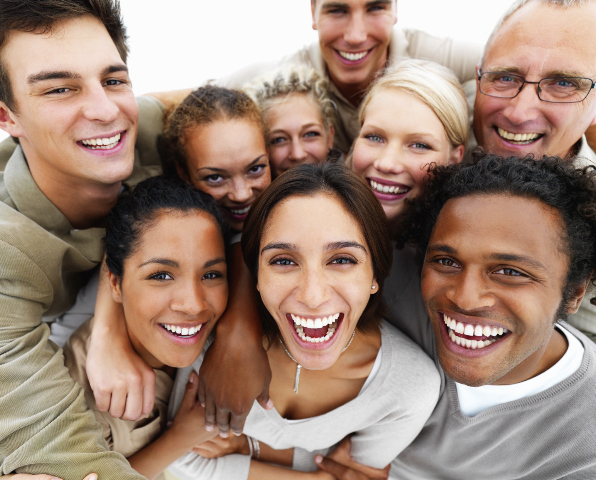 Closeup portrait of business colleagues holding each other and laughing