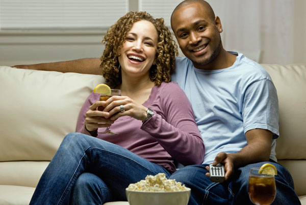 couple-couch-remote-tv