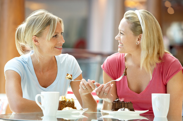 Female Friends Having Lunch Together At The Mall