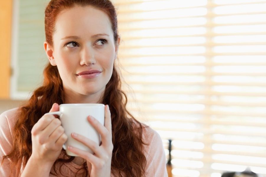 woman holding cup