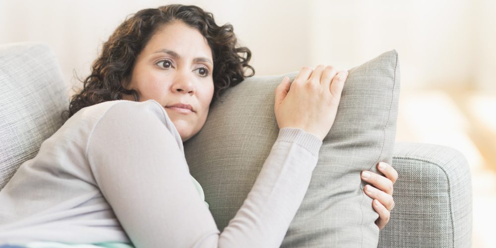 woman relaxing on sofa