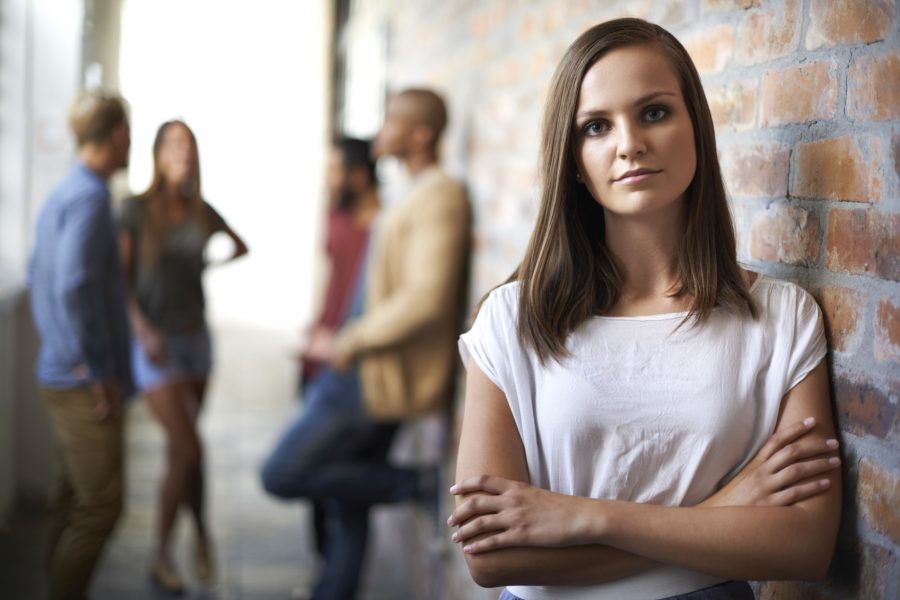 Woman standing out in crowd