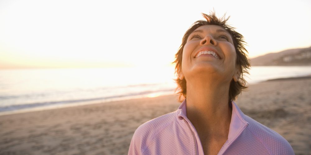 content woman looking at sky